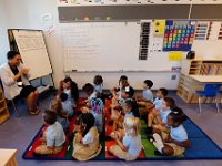 00023955A ma nb AlmadelMar1stDay  Kindergaten teacher Mrs. Faustina Depina welcomes her students to their new classroom on the first day of school at the Alma del Mar's new school on Belleville Avenue in the north end of New Bedford.   PETER PEREIRA/THE STANDARD-TIMES/SCMG : school, education